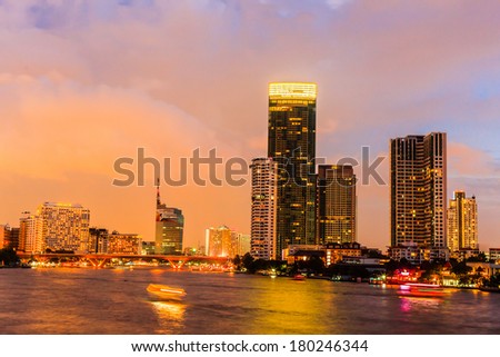 Landscape of Bangkok City light with Chao Praya River in dusk