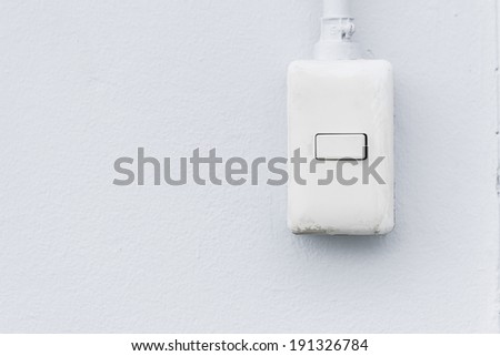 White light switch  on wall
