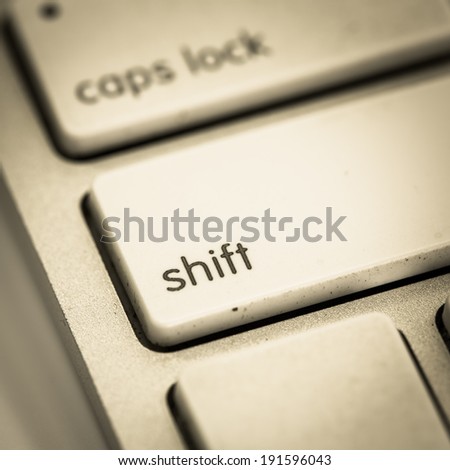 White computer keyboard close-up . Shift button. Vintage style