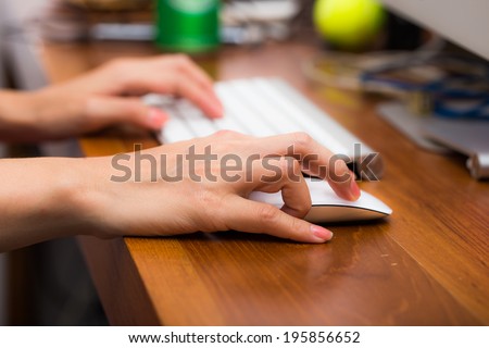 Woman\'s hand typing on computer keyboard