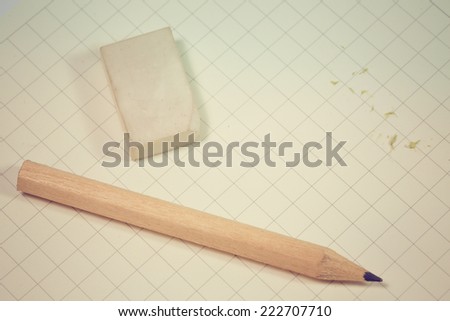 Drafting paper or graph paper with pencil and eraser.