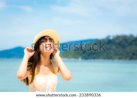 Asian girl and sea, Lipe island, Andaman sea, Thailand.