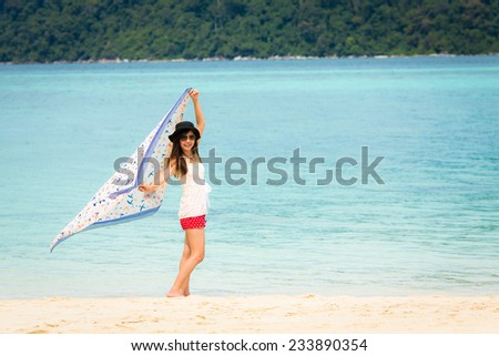 Asian girl and beautiful beach and sea, Lipe island, Andaman sea, Thailand.
