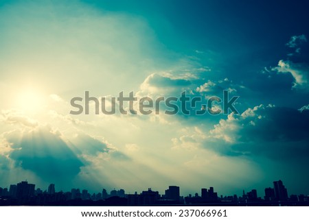 Sun ray over Bangkok city. Retro filter.