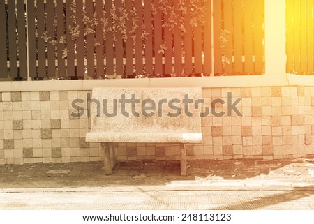 Empty stone bench. Vintage filter.