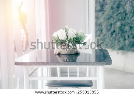 Bouquet of rose flower decor on table. vintage filter.