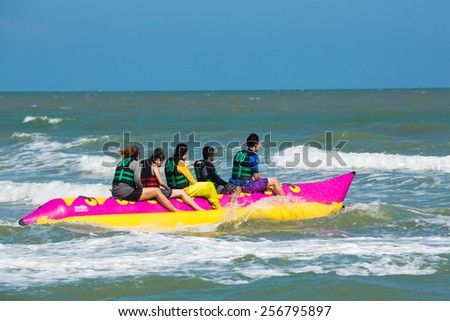 Petchaburi- Feb 21:  Tourists enjoying ride a Banana Boat adventure on February 21,2015 in Petchaburi Thailand.