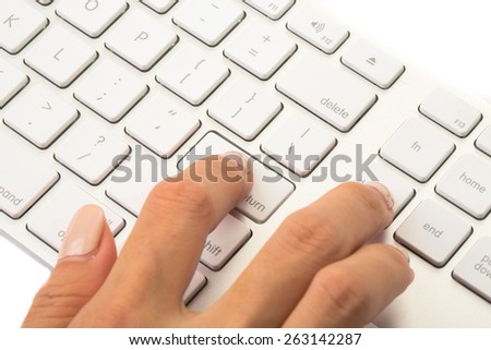 Business woman press enter on white keyboard to start or end commercial process.
