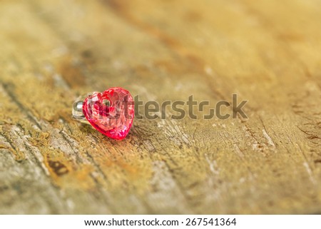 Valentine day background.  Love Heart on wooden table. Vintage filter