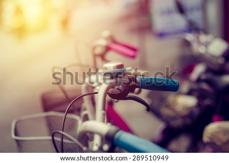 Bicycle handle bar close up. Summer vintage filter.