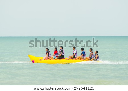 Petchaburi- Jun 28: Tourists enjoying ride a Banana Boat adventure on June 28,2015 in Petchaburi Thailand.