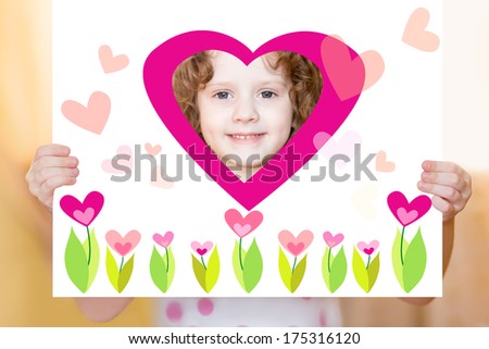 Girl holding a picture with hearts and flowers with a slot for the head.