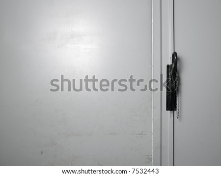 black door handle on white steel door