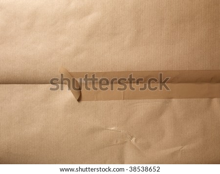 A packet  with a open tape.