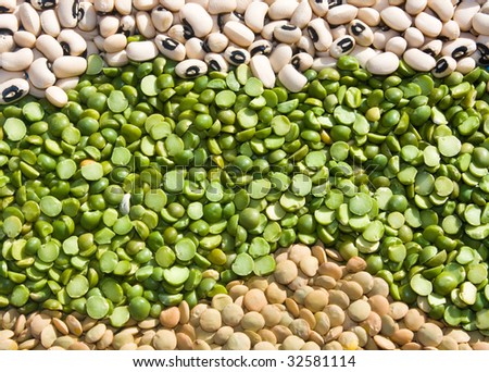 Raw Food Backgrounds - Dry lentils, green peas and black-eyed beans.