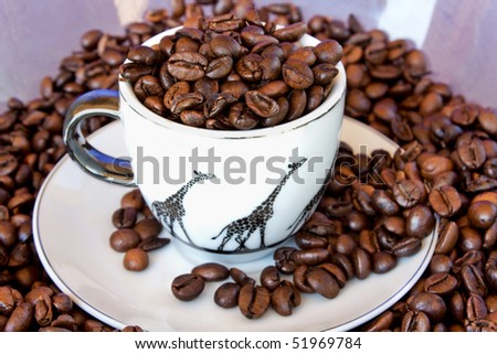 Food & Drinks - Cup With Roasted Coffee Grains.