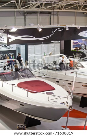 ROME, ITALY - FEBRUARY 19: Big Blue Rome Sea Expo - Boat Show - The stand of Fiart Mare exposing some elegant new models - February 19, 2011 in Rome.