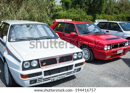 ANGUILLARA SABAZIA, LAZIO, ITALY - APRIL 6, 2014: Many Lancia Delta vintage rally cars joined with the occasion of the 11-th meeting of spring memorial Luciano Polverari.