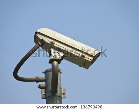 side part of CCTV camera in blue sky