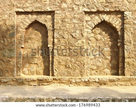 dual stone arch in india style decoration in sunlight