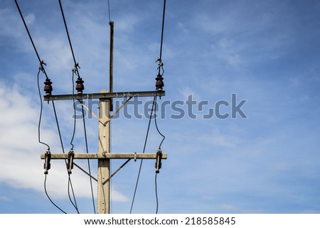 top part of electric pole in sunny day