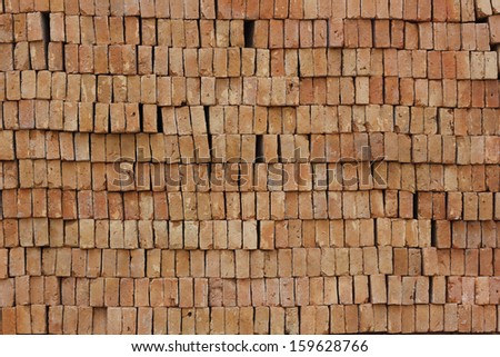 Red bricks laid into the wall