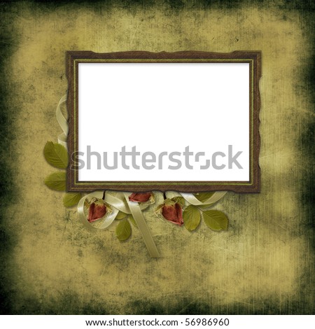 old frame over grunge wallpaper and roses