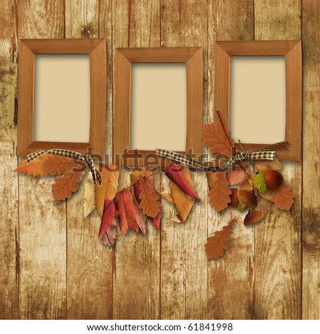 autumn frame on  wooden background