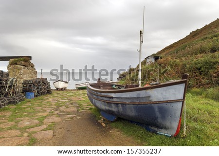 Fishing boats at Penberth Cove in Cornwall, a quiet unspoilt traditional fishing village on te Lands End Peninsular