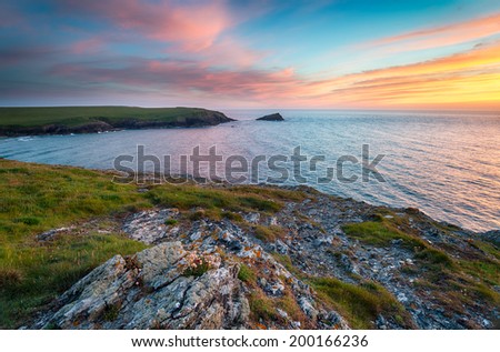 Sunset at West Pentire above Crantock near Newquay and looking out to Kelsey Head and Porth Joke