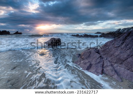 Stormy sunset at Freathy on Whitsand Bay in Cornwall