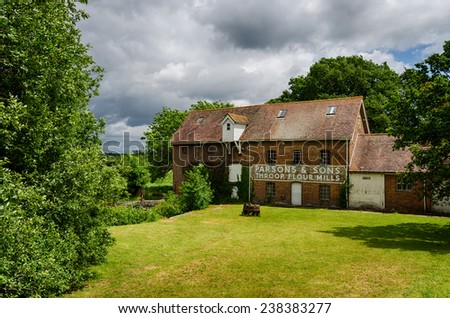 THROOP, UK - June 2012: Abandoned flour mill on the banks of the river Stour which ceased working in 1972