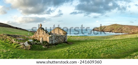 A panoramic view of Cape Cornwall near Land\'s End with the ruins of St Helen\'s Oratory an ancient chapel dating back to Roman times