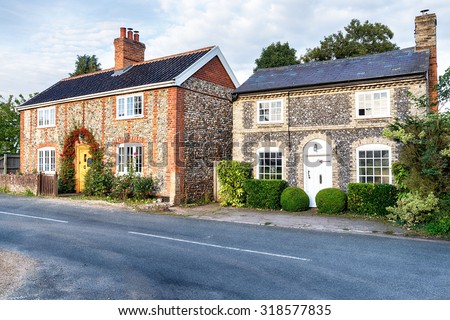Pretty country cottages made from brick and flint in Norfolk