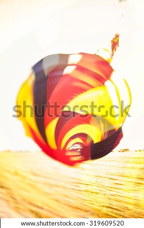 Kite with German national colors on the beach of St. Peter-Ording.