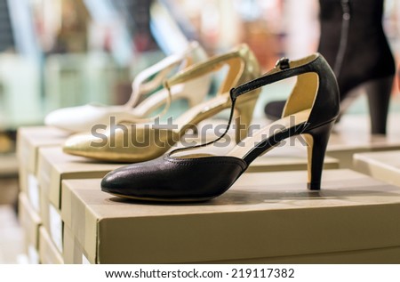 Typical women\'s middle heel shoes in a retail store