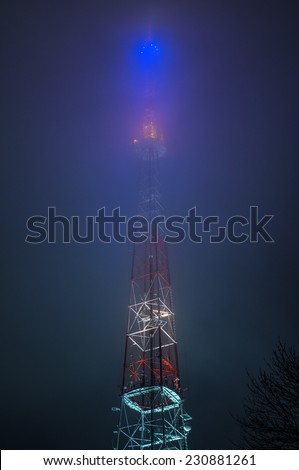 Lviv TV tower in the night fog
