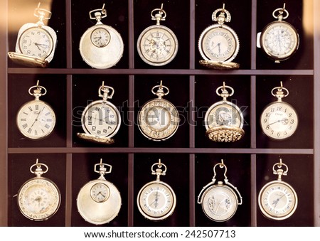 Vienna, Austria - September 21, 2014: Vintage pocket watches displayed in a shopwindow.