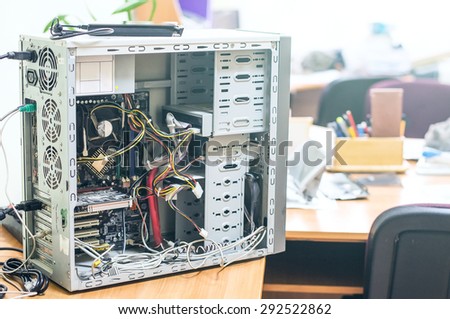 Computer being repaired in office
