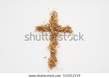 Cross made of cigarettes is a concept: smoking leads to death