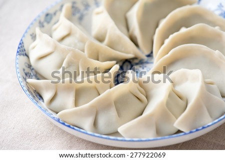 Chinese dumplings. Lunar new year dish. Dumpling is a traditional dish for Chinese New Year\'s Eve.