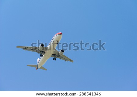 SHANGHAI, CHINA, April 2,  2015: China Eastern Airlines Airbus A320( B-6802) flying in the sky.