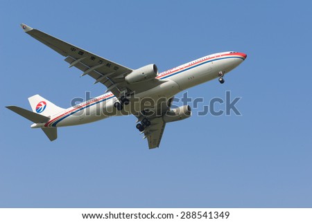 SHANGHAI, CHINA, April 2,  2015: China Eastern Airlines A330 flying in the sky.