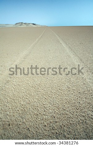 track in flat desert