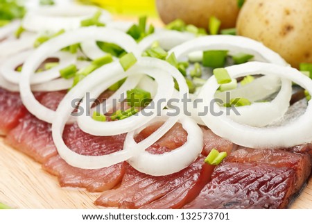 Herring with boiled potato and onion