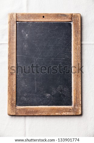 Vintage Slate Chalk Board On Textured Background