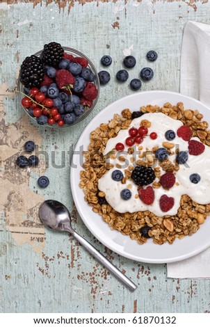 Healthy Breakfast with muesli on textured background