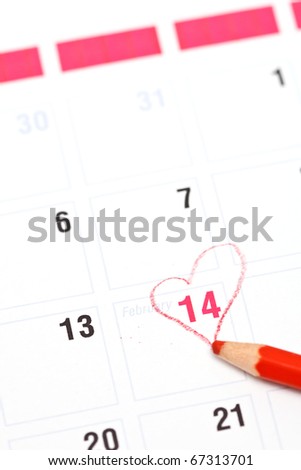 Calendar reminder 14 February St. Valentine\'s Day and red pencil