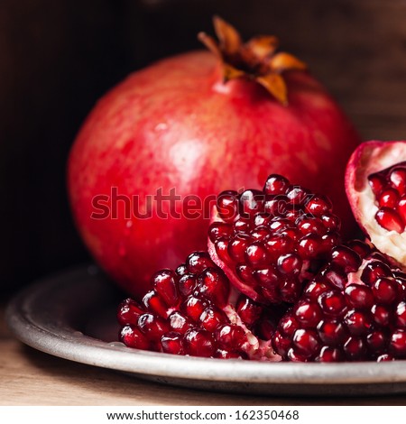 Pieces And Grains Of Ripe Pomegranate