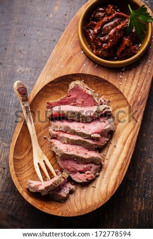 Roast beef and wooden fork